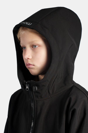 Child wearing a black hooded jacket with a brand logo on a white background